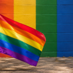Rainbow Pride flag symbolising the LGBTQ+, gay, lesbian, bisexual, transgender and queer community during Pride Month in India.